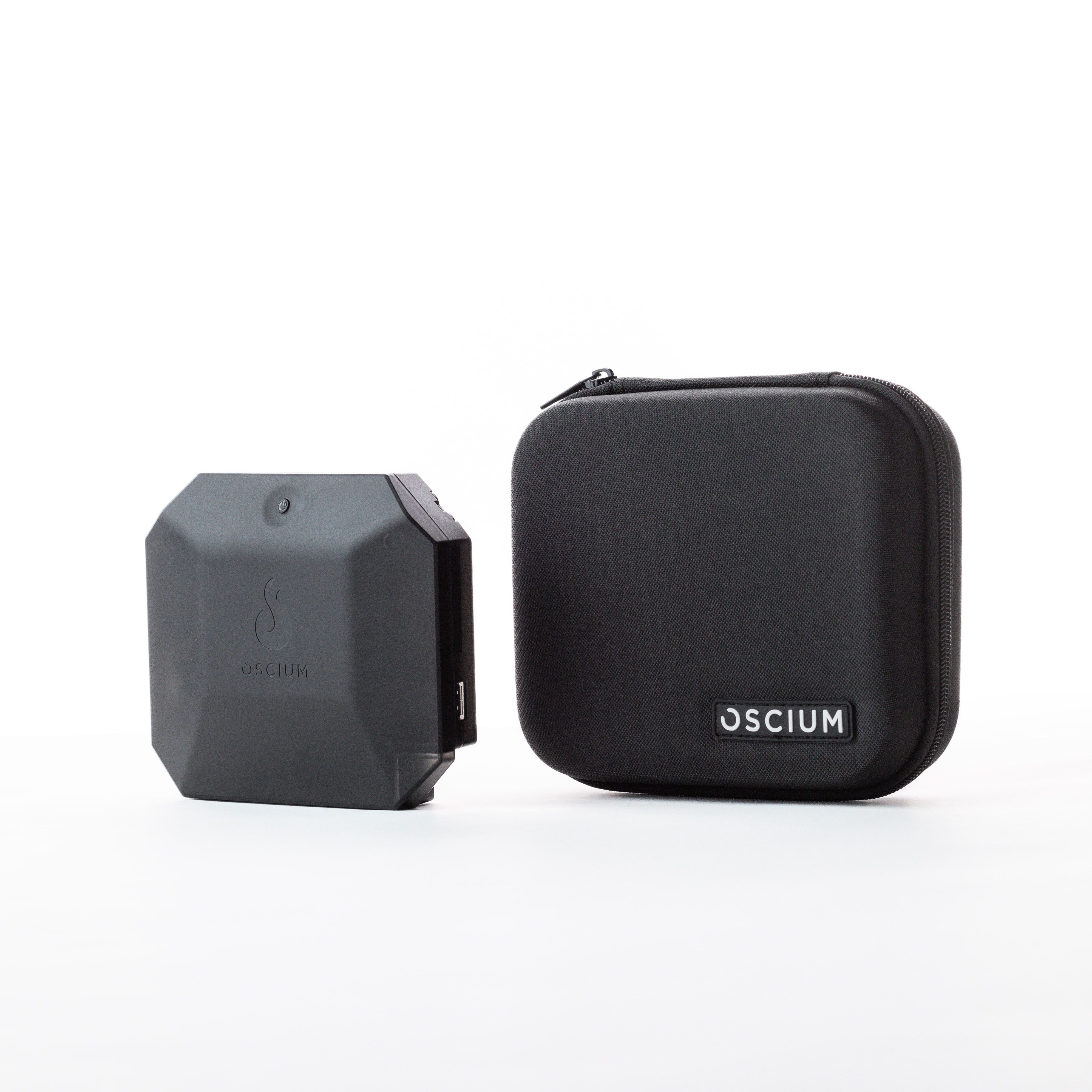 Oscium Nomad wearable Wi‑Fi measurement device with four‑radio 802.11ax/802.11be capability shown beside its black protective carrying case on a white background.