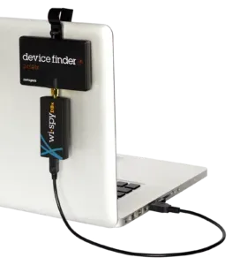 Laptop with a Device Finder unit attached to the back of the screen and connected by USB to a SkyX module, shown as part of a hardware setup for signal‑tracking or device‑location workflows.